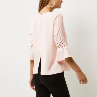 Light pink lace trim bell sleeve top